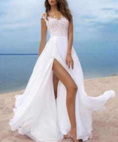 img 1 attached to Elegant Beach Wedding Dress: Modest Lace Cap Sleeves, High Split & Lace-Up Back Long Gowns