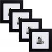 🖼️ customizable wall display: designovation museum wooden traditional picture frame set, black, 4 pack - 8x8 matted to 4x4 size logo