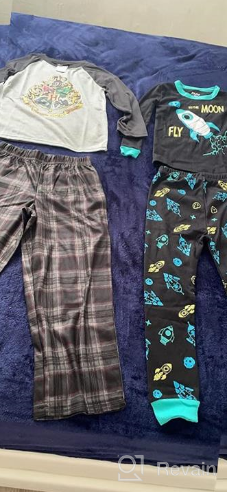 img 1 attached to Rocket Christmas Pajamas Set for Boys 🚀 and Girls - 4 Piece Sleepwear Pants Set review by Jabari Campbell