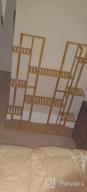 картинка 1 прикреплена к отзыву Внутренний/наружный стеллаж для горшков: 9-ярусная бамбуковая полка для дисплея 17 растений в горшках, идеально подходит для украшения патио, сада, балкона или гостиной. от Jeff Talcott