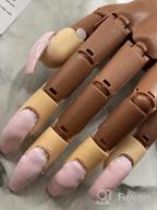 картинка 1 прикреплена к отзыву Flexible Nail Training Hand With 100 Fake Nail Tips - Practice Acrylic Nails, Print & DIY With Moveable False Mannequin Hands - Perfect Practice Tool For Beginners от Douglas Norton