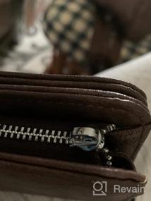 img 8 attached to Большой кожаный женский кошелек с органайзером, визитницей и браслетом - Дизайнерский дорожный клатч черного цвета с коричневыми вставками от CLUCI