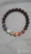img 1 attached to Cherry Tree Collection Chakra Stretch Bracelet: Genuine 8mm Gemstones, Sterling Silver Spacers. Perfect for Men/Women. Choose from Small, Medium, or Large Sizes! review by Bill Roberts