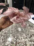 img 1 attached to Women'S Feather Flower Veil Fascinator Hair Clip Hat Bowler Tea Party Wedding Hat review by Tom Bailey