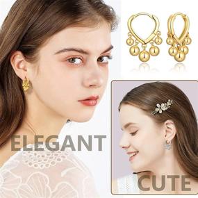 img 1 attached to 14K Gold Plated Huggie Hoop Earrings For Women With Dangling Ball Accents - Cute And Stylish Earrings For Girls