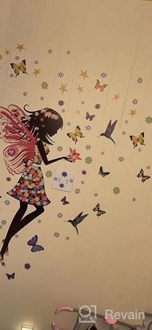 img 1 attached to Colorful Butterfly Girl Wall Decal With Flower Fairy Design - DIY Vinyl Mural Art For Baby Nursery, Bedroom, Playroom, And Home Decoration - Perfect For Girls Room review by Fred Boals