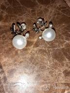 img 1 attached to 🦌 ROSTIVO Christmas Earrings: Cute Pearl Antler Studs for Women & Teen Girls (Gold) review by Chris Wilson