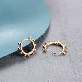 img 1 attached to Gold Plated Hypoallergenic Huggie Hoop Earrings For Women - Dainty Beaded, Circle, Spike, Snake, Heart, Lightning, And CZ Styles Available By Fettero