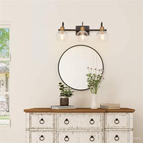 img 2 attached to 🚽 LALUZ Oil Rubbed Bronze Bathroom Light Fixtures, Vanity Lights with Antique Gold Socket, Clear Glass Shade, 22.5’’ L x 7’’ W x 9’’ H